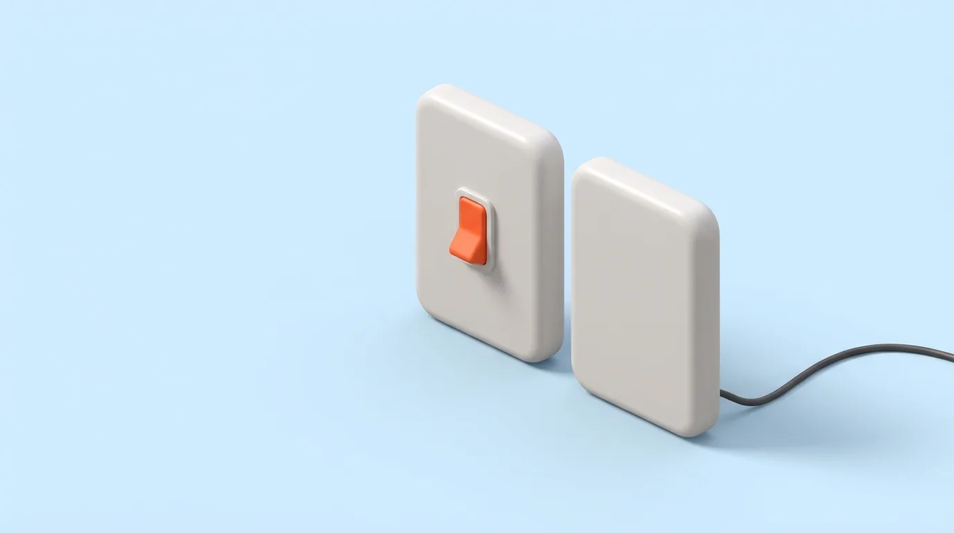 Two white switch plates on a pale blue ground, one with an orange toggle switch and one blank with a connected cable
